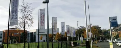  ??  ?? Macclesfie­ld College put up flag poles without planning permission