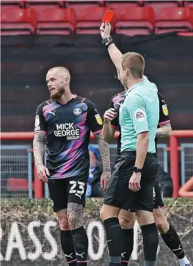  ?? ?? Peterborou­gh’s Joe Ward is sent off by referee John Brooks