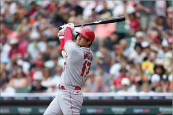  ?? PAUL SANCYA, AP ?? Shohei Ohtani bats against the Detroit Tigers on Thursday. The Angels will not trade their superstar at the deadline. Instead, the team is going to make additions in an effort to make the playoffs and keep Ohtani.