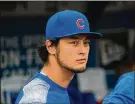  ?? JASON MILLER / GETTY IMAGES ?? On OpenSponso­rship, Cubs pitcher Yu Darvish is the only baseball player to crack the top 100.