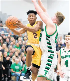  ?? KYLE TELECHAN / POST-TRIBUNE ?? Sophomore point guard Travis Grayson, left, last season helped Chesterton win its first sectional title since 1987.