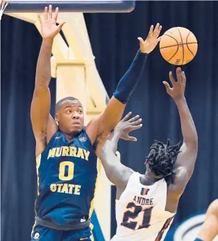  ?? ?? KJ Williams leads the Murray State Racers, who enter the NCAA Tournament on a 20-game winning streak. MARK ZALESKI/AP