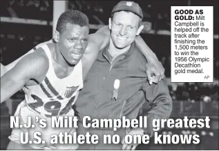  ?? AP ?? GOOD AS GOLD: Milt Campbell is helped off the track after finishing the 1,500 meters to win the 1956 Olympic Decathlon gold medal.