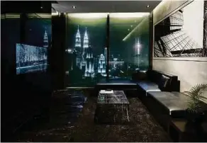  ??  ?? A living room with Kuala Lumpur city centre view by Studio F.A. Porsche.