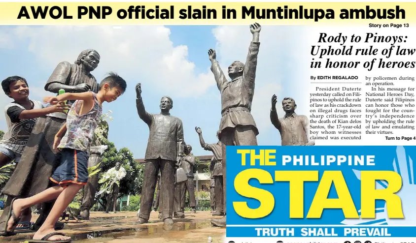  ?? MICHAEL VARCAS ?? Children run around the statues of heroes at the Cry of Pugad Lawin Shrine in Quezon City yesterday. The country commemorat­es today National Heroes’ Day, which honors and remembers all Philippine heroes.