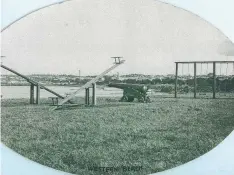  ?? Picture: GEELONG HERITAGE CENTRE COLLECTION ?? One of the naval guns at Cannon Hill on Western Beach with the city in the background.