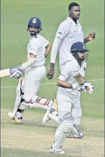  ?? AFP ?? Ajinkya Rahane (left) and Rishabh Pant (right) saved the blushes after India lost four wickets with 162 on board on Day 2 of the second Test against West Indies in Hyderabad on Saturday.