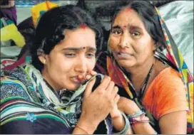  ?? AP ?? Relatives mourn the death of a child at BRD Medical College Hospital in Gorakhpur.