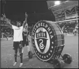  ?? Associated Press ?? Philadelph­ia Union’s Cory Burke reacts after hitting the drum following the second half against New York City FC, Sunday, in Chester, Pa. The Union won 3-1 at play LAFC in the Final today.