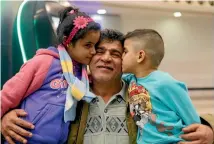  ?? REUTERS ?? Nizar al-Qassab, an Iraqi Christian refugee from Mosul, sees his children off at Beirut internatio­nal airport before their flight to the United States. People from seven Muslim-majority countries, including Iraq, once barred from entering the US can...