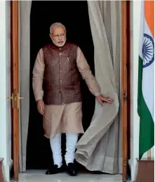  ??  ?? PM Narendra Modi in kurta-pyjama and Nehru jacket