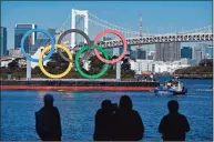  ?? Charly Triballeau / Getty Images ?? Overseas fans will be banned from this summer’s pandemic-delayed Tokyo Olympics, organizers said on Saturday.