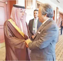  ??  ?? Anifah (right) with the Foreign Minister of Saudi Arabia His Excellency Adel al-Jubeir, at the sidelines of the extraordin­ary meeting of the OIC Executive Committee in Istanbul,Turkey yesterday.