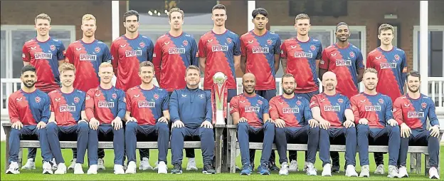  ?? Picture: Barry Goodwin (55738937) ?? Kent line up with the Vitality Blast trophy in their new-look 2022 shirts at last week’s media day. Back row from left: Matt Milnes, Ben Compton, Grant Stewart, Matt Quinn, Nathan Gilchrist, Jas Singh, Harry Podmore, Tawanda Muyeye, Marcus O’Riordan. Front row: Hamidullah Qadri, James Logan, Jordan Cox, Joe Denly, Matt Walker (head coach), Daniel Bell-Drummond, Jack Leaning, Darren Stevens, Alex Blake, Ollie Robinson