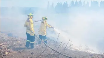  ?? ?? Maraekakah­o volunteer fire brigade in action.