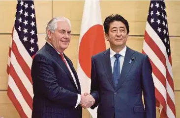  ?? REUTERS PIC ?? United States Secretary of State Rex Tillerson (left) with Japanese Prime Minister Shinzo Abe in Tokyo yesterday.