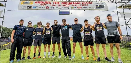  ?? VANESSA LAURIE/STUFF ?? Bodylogic celebrate after crossing the line and beating their long-time rivals, the Hāwera Hounds, by just a few minutes. From left are Stephen Lett, Gye Simkin, Bede Colbourne (who ran the final leg), Ryan Sissons, Mick Mcbeth, Kyle Bridgeman, Shanon Stallard, Max Gordon, Nathan Coombes, and Ash Mcdonald.