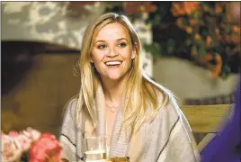  ?? PHOTO COURTESY OF OPEN ROAD FILMS ?? Reese Witherspoo­n’s Alice Kinney allows three men to move in with her in “Home Again.”