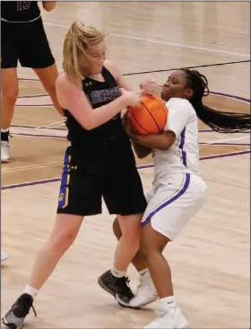  ?? Lauren Cross/Wildcat Yearbook ?? It's mine: El Dorado's Zaria Brown tries to wrestle a steal away from Hot Spring Lakeside's Bonnie Formsby. El Dorado's varsity basketball teams will travel to Pine Bluff on Tuesday.