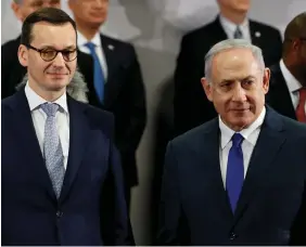 ?? PHOTO: REUTERS ?? Split: Polish Prime Minister Mateusz Morawiecki and Israeli Prime Minister Benjamin Netanyahu.