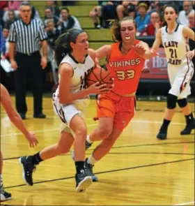  ??  ?? Boyertown’s Kylie Webb (13) drives to the basket as Perkiomen Valley’s Alex Blomstrom defends during the second quarter Tuesday.