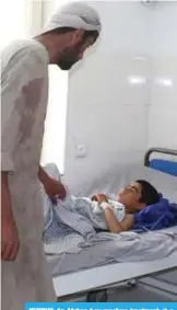  ??  ?? KUNDUZ: An Afghan boy receives treatment at a hospital. —AFP