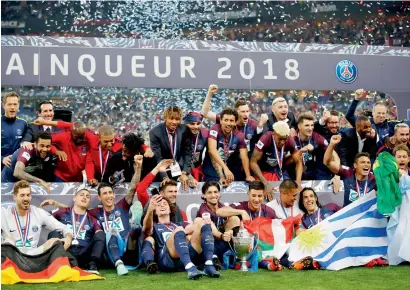  ?? AP ?? PSG players celebrate after the French Cup final against Les Herbiers at the Stade de France, outside Paris, on Tuesday. —