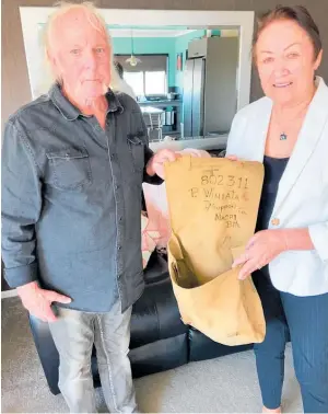  ?? Photos / Supplied ?? Joe Martin handing back the Winiata wha¯ nau taonga to Private Pataka Winiata’s daughter Sharon MacDonald on Friday, May 6.