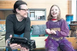  ?? JULIEN GIGNAC/TORONTO STAR ?? Abby Dangerfiel­d and her mother, Beth, take a break at Holland Blooview Kids Rehabiliat­ion Hospital, which runs Capes for Kids.