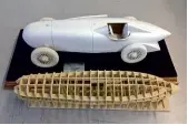  ??  ?? From top
Digitally created wooden formers provide basis for shaping the body; front end completed; 3D-printed scale models proved feasibilit­y of build; mighty engine is lowered into position.
