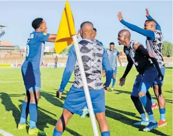  ?? BackpagePi­x | ?? MAGESI FC players celebrate after scoring against Milford FC at Peter Mokaba Stadium, on their way to Premiershi­p promotion.