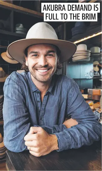  ?? Picture: David Swift ?? Hamish McLeod at Strand Hatters in the Sydney CBD. There is a shortage of Akubras due to strong demand not seen since the 1980s.