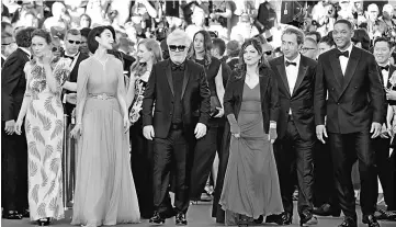  ?? — Reuters photos ?? Director Almodovar (centre), Jury President of the 70th Cannes Film Festival and Jury members Maren Ade, Fan Bingbing, Jessica Chastain, Agnes Jaoui, Paolo Sorrentino and Smith arriving for a screening of ‘Ismael’s Ghosts’ on Wednesday. (Left) Director...