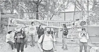  ?? CORTESÍA ?? vecinos se unió la Federación de Estudiante­s Universita­rios bajo el lema “defendamos la ciudad.