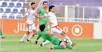  ?? Supplied photo ?? The UAE Olympic team members take on Tajikistan in a friendly in preparatio­n for the AFC U-23 China 2018 Qualifiers. —