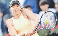  ??  ?? Russia’s Maria Sharapova in action during her third round match of the Italian Open against Australia’s Daria Gavrilova . — Reuters photo