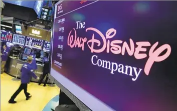  ?? Richard Drew Associated Press ?? DISNEY, whose India streaming operation has posted significan­t losses, saw its stock rise 1% on news of the deal. The new joint venture will have exclusive rights to distribute Disney films and other production­s in India.