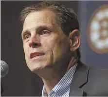  ?? STAFF PHOTO BY ANGELA ROWLINGS ?? MOVING FORWARD: Bruins general manager Don Sweeney speaks to reporters during a news conference yesterday at the Garden.