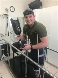  ?? Photo courtesy of Garrett Rifkin ?? Deputy Garrett Rifkin smiles at a physical therapy appointmen­t as he takes rehabilita­tion day by day. His doctors cleared him for light duty Wednesday. He will return to work as a sheriff’s deputy on Nov. 4.