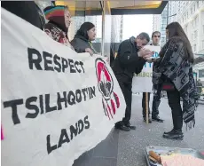  ?? JONATHAN HAYWARD/THE CANADIAN PRESS/FILES ?? Members of the Tsilhqot’in rally outside the Federal Court in Vancouver on Jan. 30. They are awaiting a court decision on Taseko’s New Prosperity mine proposal.