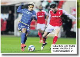  ??  ?? Substitute Lyle Taylor almost doubled the visitor’s lead late on