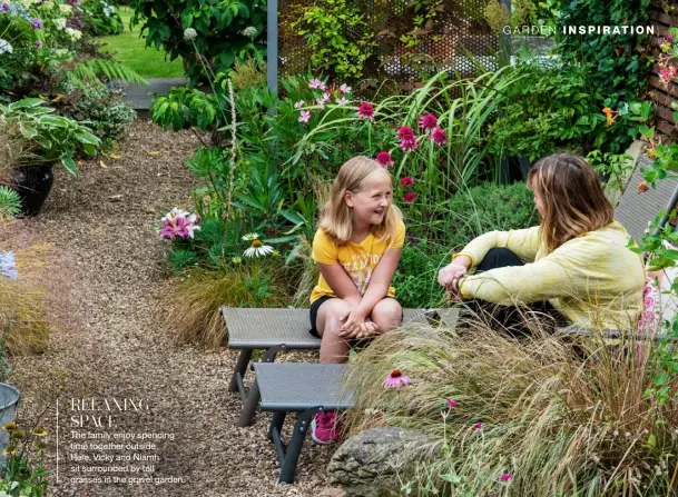  ??  ?? RELAXING SPACE
The family enjoy spending time together outside.
Here, Vicky and Niamh sit surrounded by tall grasses in the gravel garden