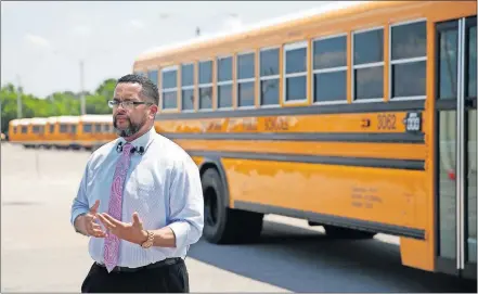  ?? [SARAH PHIPPS PHOTOS/ THE OKLAHOMAN] ?? Deputy Superinten­dent Jason Brown speaks during a news conference at the Operations Center/Bus Barn for Oklahoma City Public Schools.