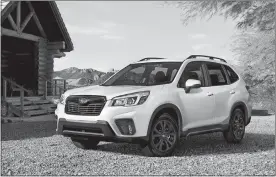  ?? SUBARU VIA AP ?? The Subaru Forester, a crossover that has both city and off-road capabiliti­es.