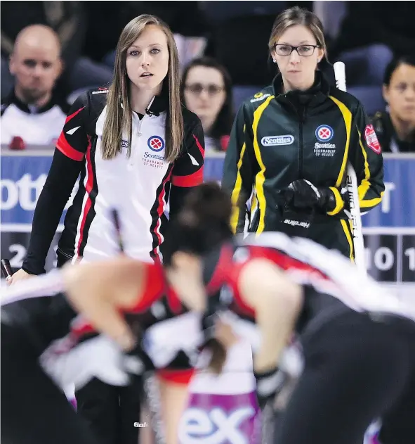  ?? — THE CANADIAN PRESS ?? Ontario skip Rachel Homan, left, seen next to Northern Ontario skip Krista McCarville during a match at the Scotties Tournament of Hearts in St. Catharines, Ont., on Wednesday, “really has quite a sense of humour,” according to her rink’s third, Emma...