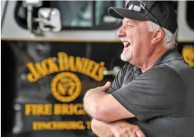  ?? PHOTOS BY LARRY MCCORMACK/THE TENNESSEAN ?? Fire Chief and Security Supervisor Fred Elliott shares a laugh with other members of Jack Daniel’s Volunteer Fire Brigade.