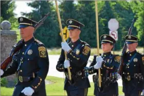  ?? MARIAN DENNIS – DIGITAL FIRST MEDIA ?? The Berks County Sheriff’s Department Honor Guard began Thursday’s Flag Day ceremony outside Keystone Villa in Douglassvi­lle with a procession toward the flag.