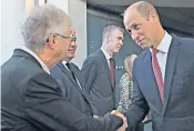  ?? ?? The Prince of Wales meets politician­s at the Senedd, above. Right, Michael Sheen has led the criticism