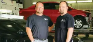  ??  ?? Todd Beene, left, business manager, and his brother Chad Beene, shop production supervisor, and their staff at Conway Collision Center work hard for their customers.