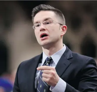  ?? Fred Chartrand/The Canadian Press ?? Pierre Poilievre, the minister of state for democratic reform, says the government will consider changing a provision to the election bill. Experts fear the clause will muzzle the chief electoral officer.